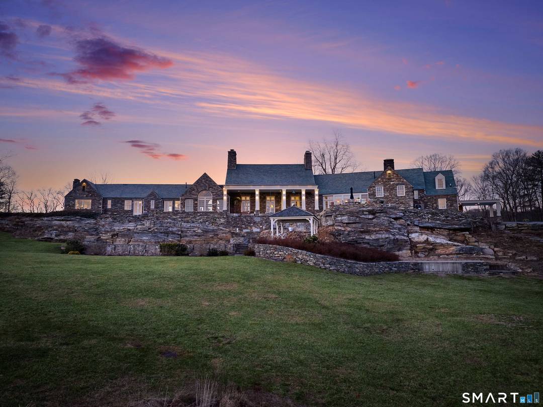 Welcome to 'Highover, ' a 25 acre hilltop estate on the Connecticut River, voted the WSJ House of the Month nationwide.