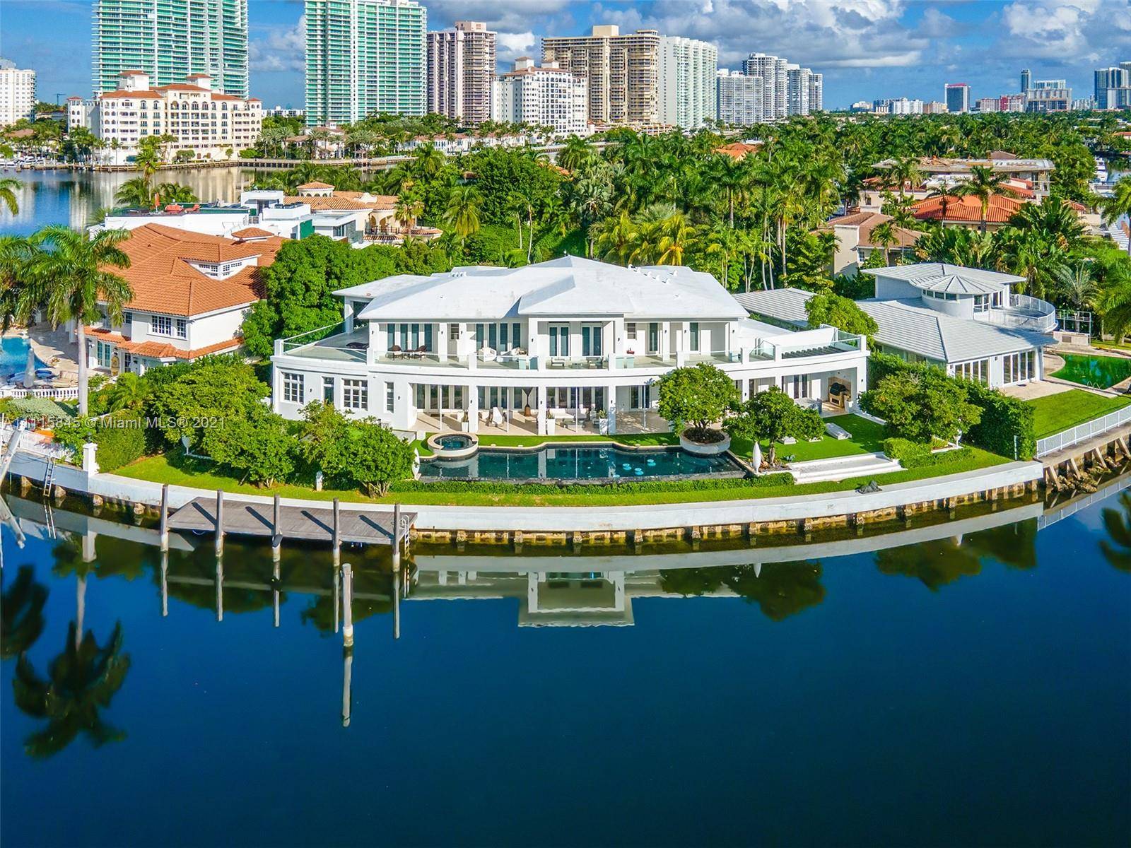 Welcome to Golden Beach s finest waterfront estate, offering 188 ft of prime water frontage and panoramic private views.