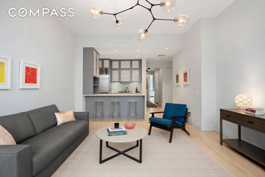 Start each day watching the sun rise over the Williamsburg Bridge from your spacious living room.