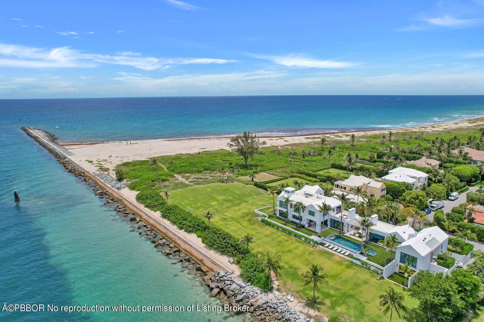 A north end contemporary Caribbean compound surrounded by 500 feet of crystal blue water.