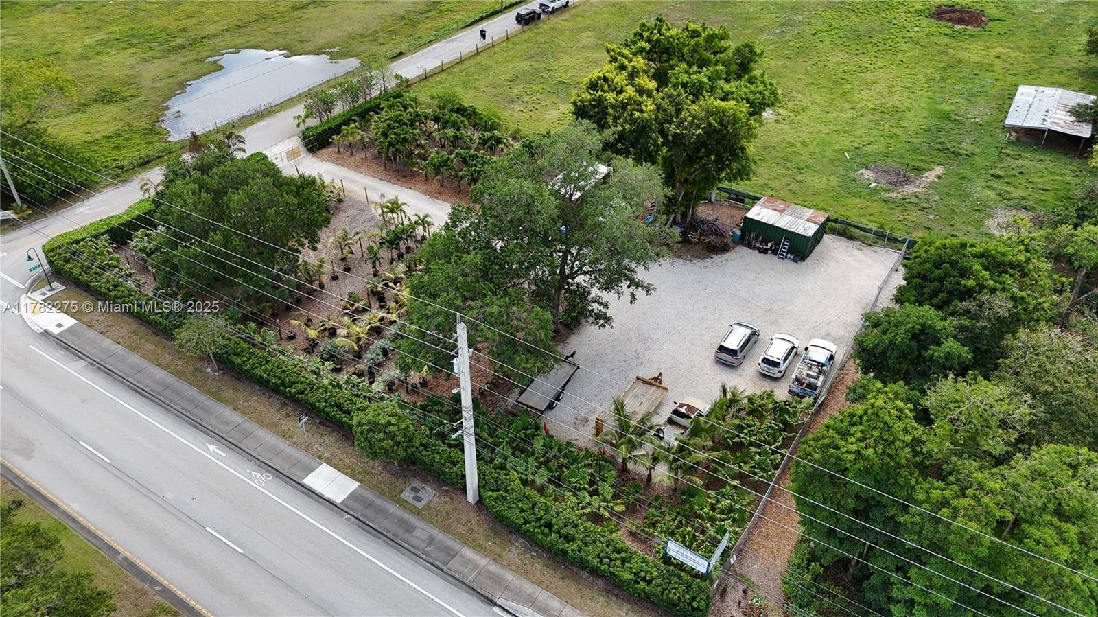 One acre of land is located in the beautiful Sunshine Ranches, which hosts a well established company specializing in tree trimming services, installation, and landscape design.