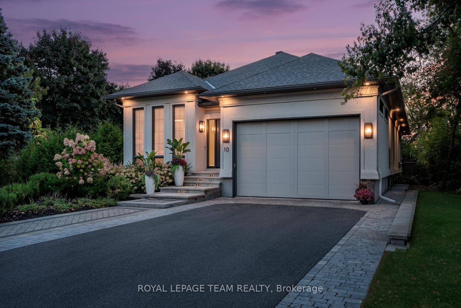 Nestled on a mature, tree lined street, this residence is a true masterpiece that redefines luxury living in central Ottawa.