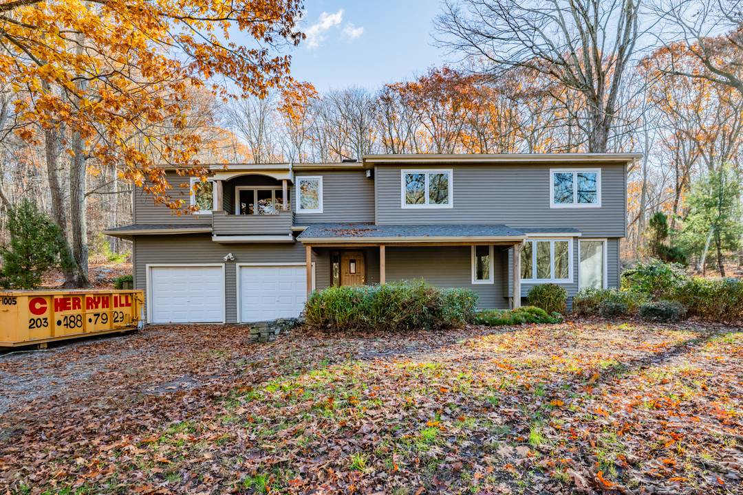 Situated on over 2 acres of private, wooded, park like grounds, this spacious Split Level home is ready to move in and put your touches on it and make it ...