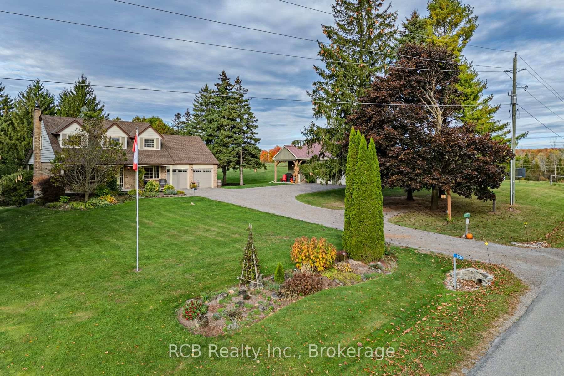 Welcome to this meticulously maintained two storey home, proudly offered by the original owners and situated on a beautifully landscaped 1.