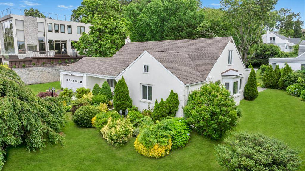Welcome to this beautiful, five bedrooms, three bathrooms expanded ranch situated on a third of an acre lot in the prestigious village of Saddle Rock with winter water views.