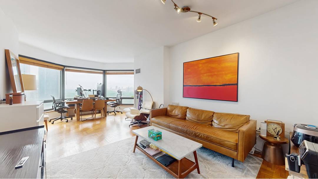Welcome to Residence 17B at Central Park Place a spacious and elegant one bedroom, one and a half bathroom home in one of Manhattan's most desirable full service condominiums.