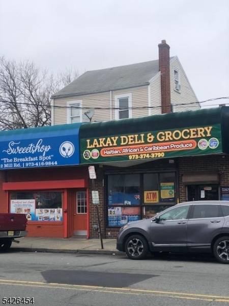 Rare mixed use offers two retail store, one two story 3 BR apartment with drive way, Backyard Excellent rental historySell As Is.