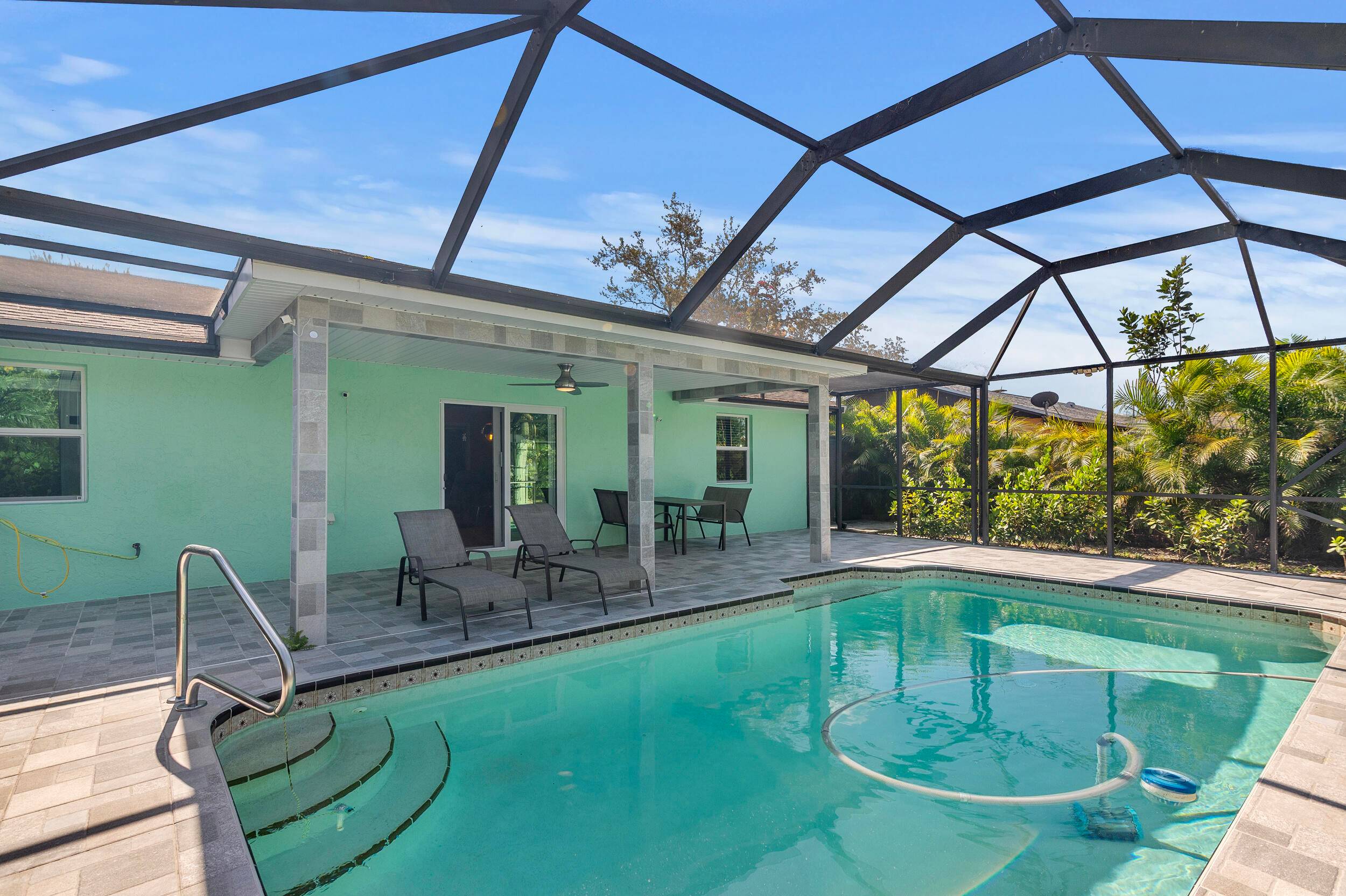 This 3 bed, 2 bath pool home is a true private oasis, packed with luxury upgrades.
