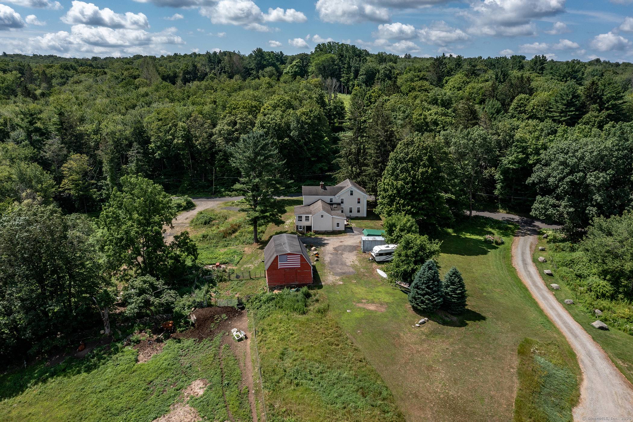 Nestled on a quiet road in the Litchfield Hills is this circa 1830 antique colonial home.