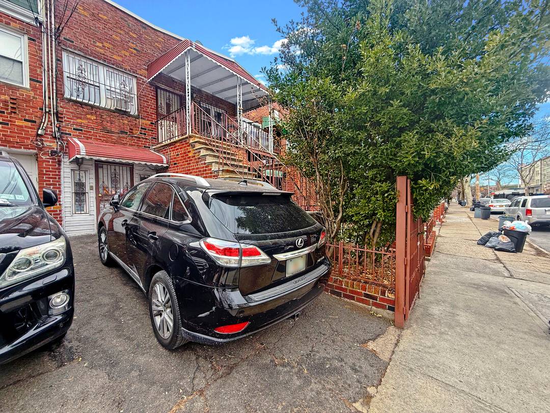 Introducing 1054 East 100th Street, a mid 20th century legal two family brick townhouse situated between Avenue J and Avenue K in the heart of Canarsie.
