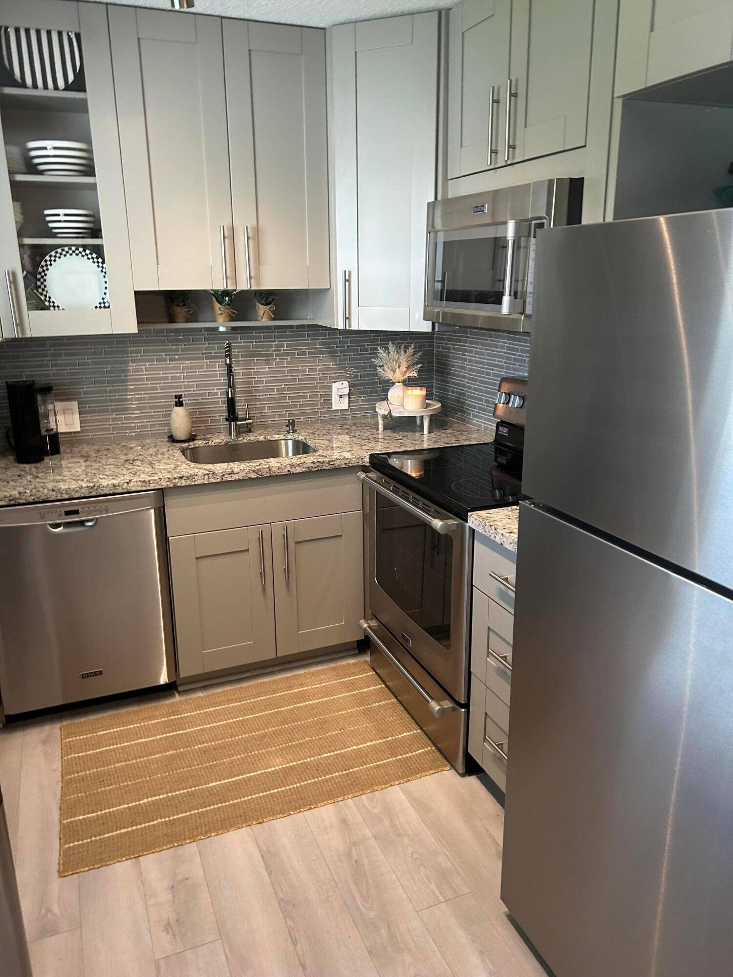 Modern, Meticulously Maintained Condo in Century Village Boca Raton Full Time Living, or Investors !
