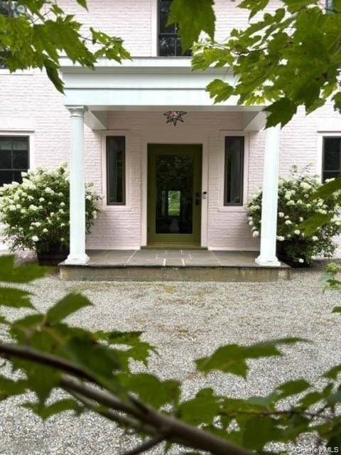 Nestled in the quaint hamlet of Clinton Corners, this rare and tasteful 18th century Georgian stone house offers classic proportions and timeless charm on beautifully established, landscaped grounds.