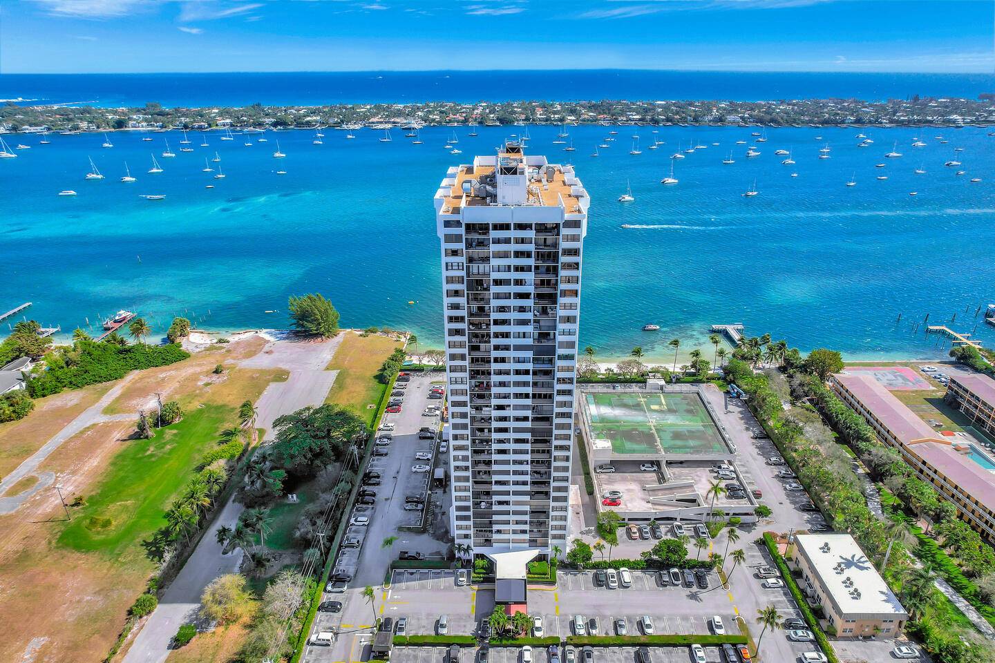 Wake up to breathtaking sunrises and sparkling million dollar views of the Intracoastal, The Breakers, and the yachts of Palm Beach.