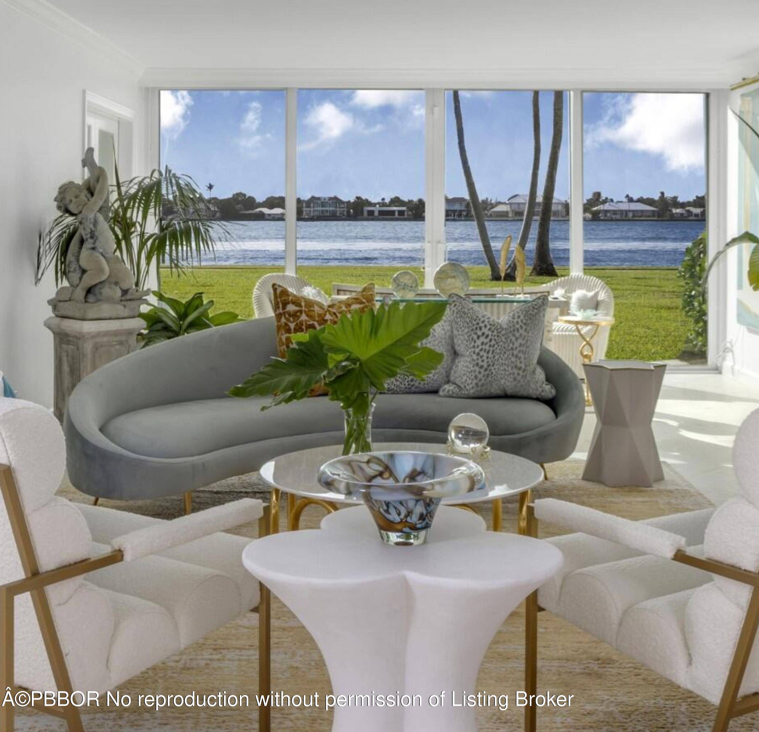 Direct Lakefront views from this 2BR 2BA first floor corner unit with an open living concept design.