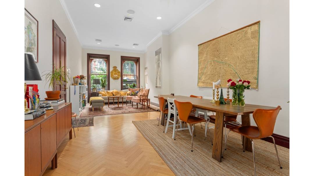 Parlor Floor Residence on Coveted UWS Block 1, 500 SF Located on a serene, tree lined stretch of West 69th Street between Central Park West and Columbus Avenue, this expansive ...