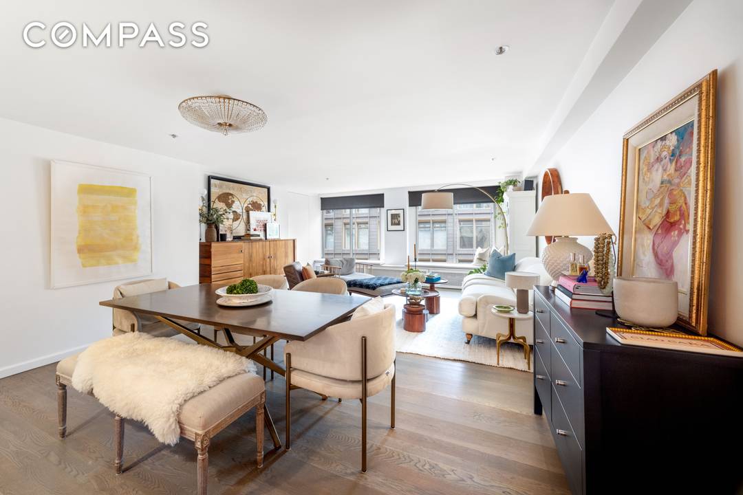 Stylish Tribeca Designer Condo with Home Office amp ; Luxe Finishes Located in the heart of Tribeca, this beautifully renovated designer condominium blends modern sophistication with loft like charm.