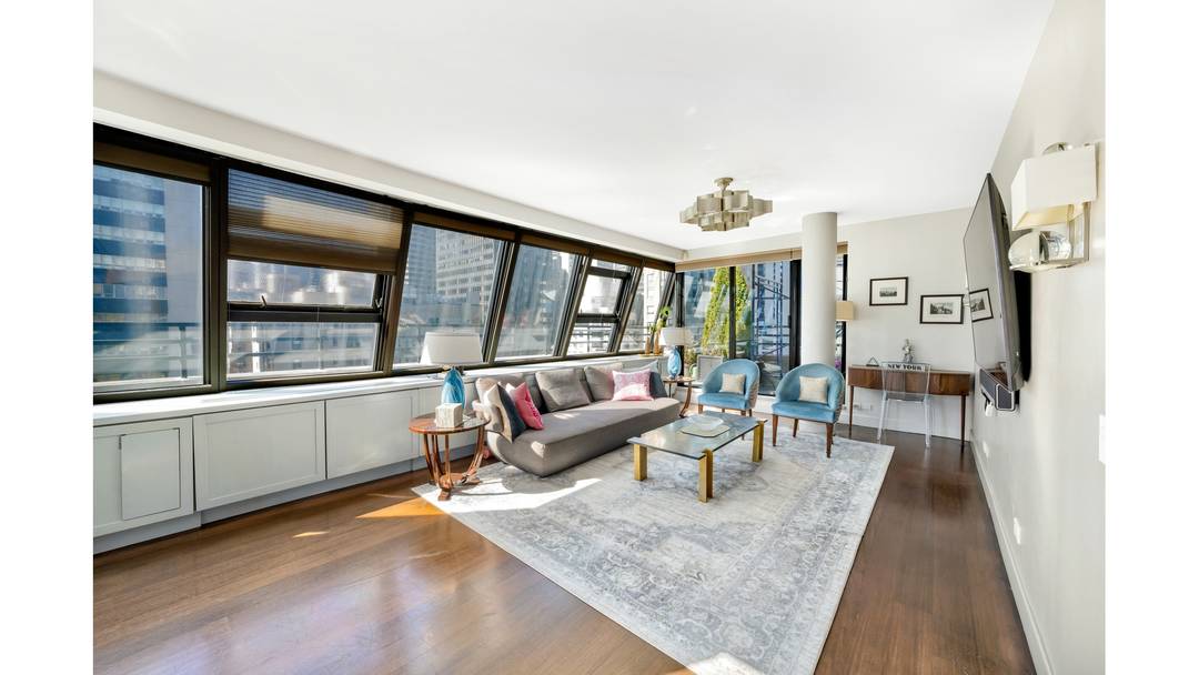 Stunning Duplex Penthouse with Panoramic City Views and Three Private Terraces.