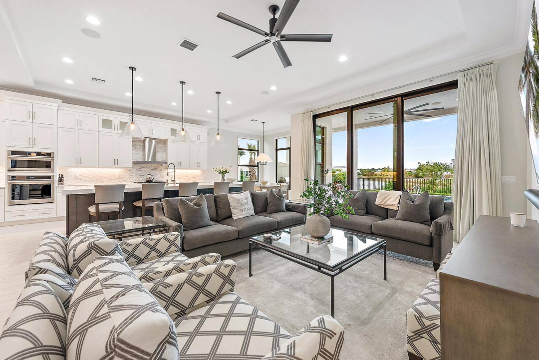 Built in 2023, this exceptional Vasari model is ideally situated on a rare long lakefront homesite, offering some of the most desirable and expansive water views in the community.