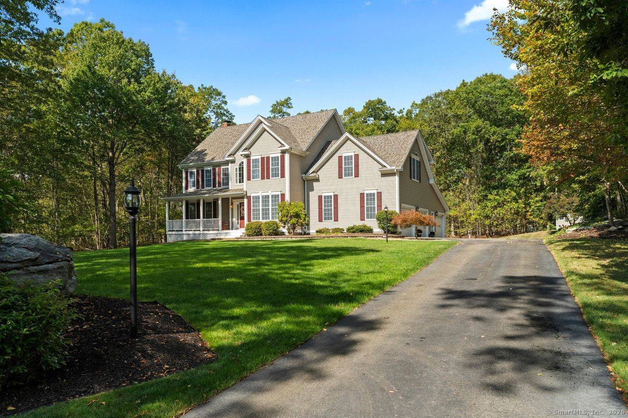 Set on a private 2 acre lot in a cul de sac neighborhood, this 4 bedroom, 2.