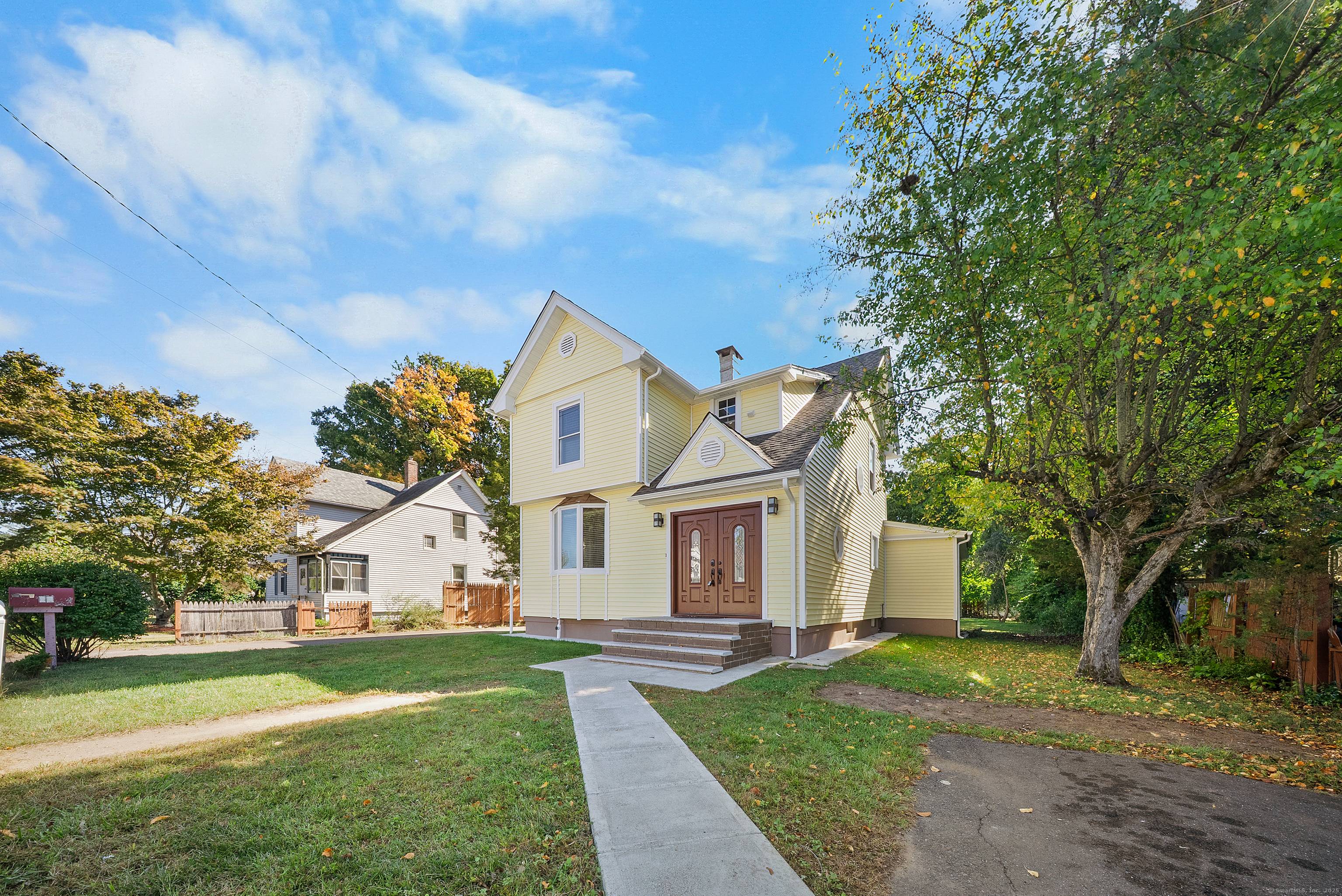 Beautifully updated colonial featuring 4 bedrooms, 2 full baths, and an extra room perfect for a home office or TV room.