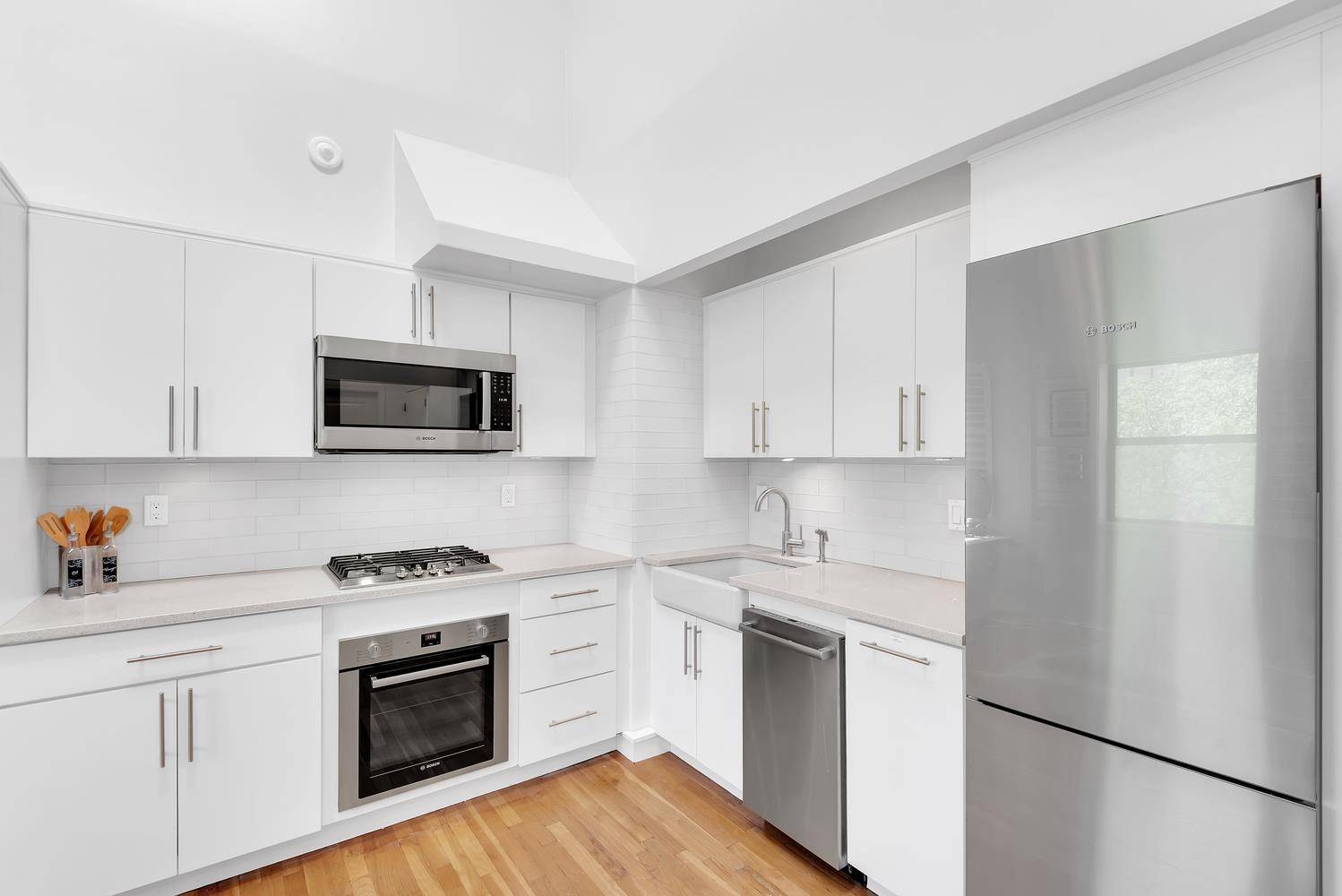 This unique corner duplex with a massive private roof deck offers the perfect mix of character, function, and location.