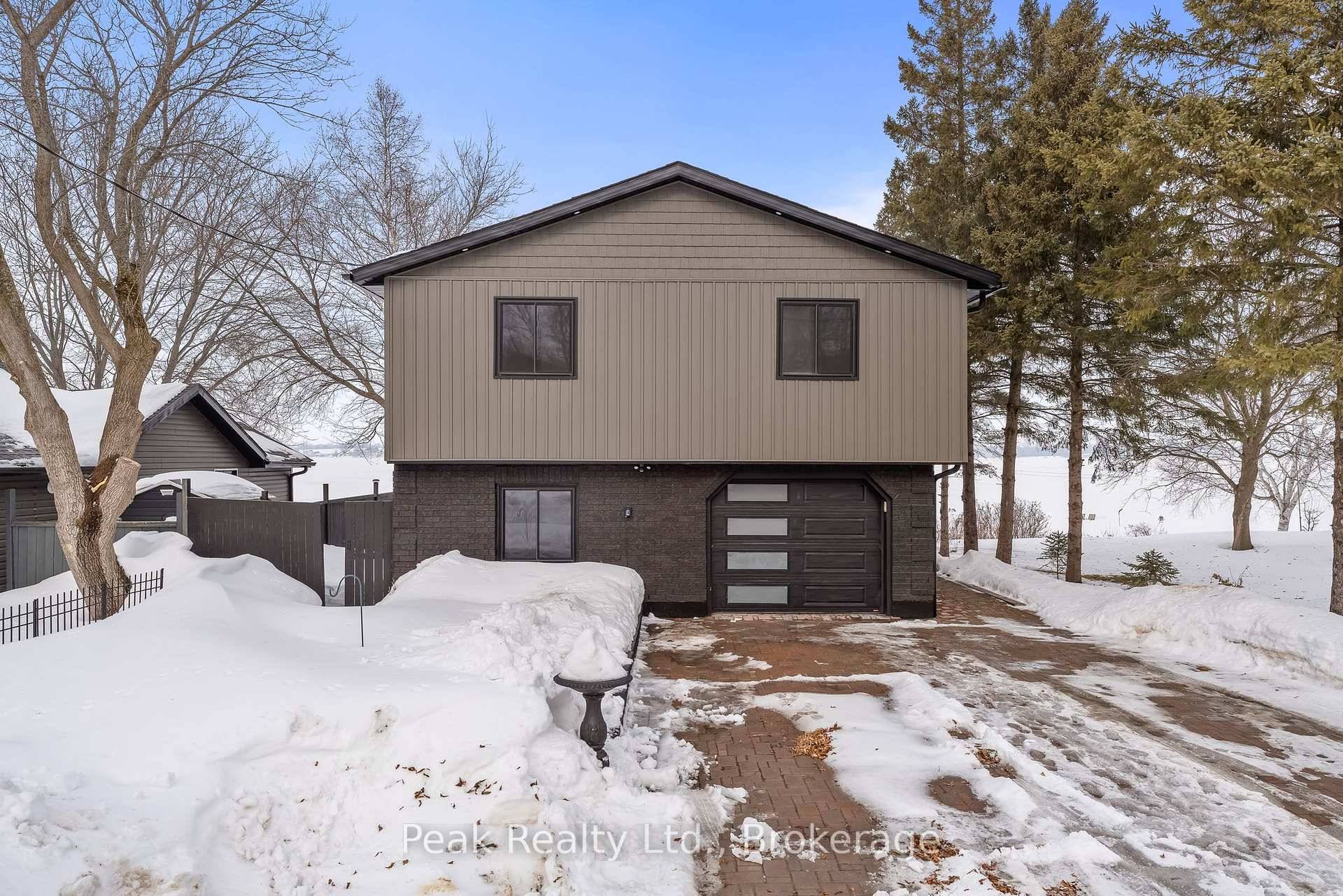 Your Dream Home by the Water Awaits !