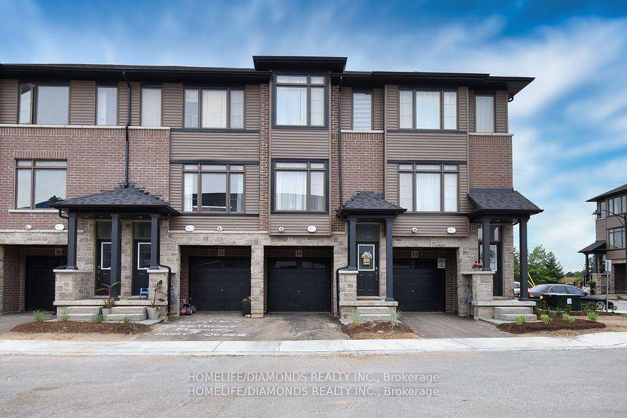 Welcome to this stunning, brand new 3 story townhome located in the charming town of Paris.