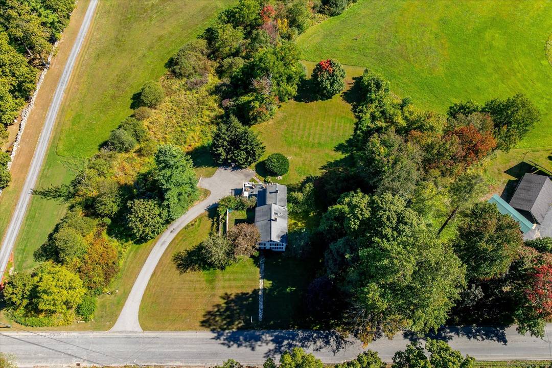 Step back in time with this one of a kind 1830 Greek Revival farmhouse, offering 2, 150 sq ft of character and charm on a picturesque 0.