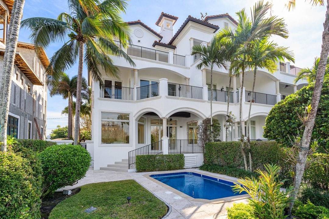 Experience luxury coastal living in this elegant 3 story townhouse on The Island, positioned along the Intracoastal Waterway and mere steps from iconic Deerfield Beach.