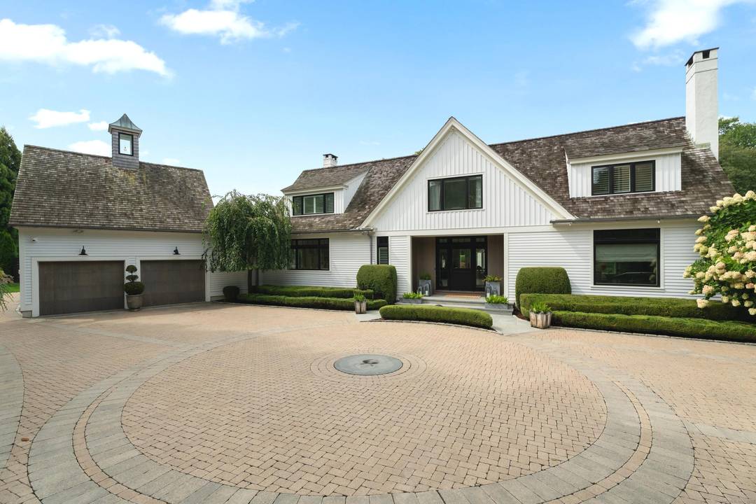 Turnkey luxury in the heart of Pine Orchard's coveted Juniper Point Association.