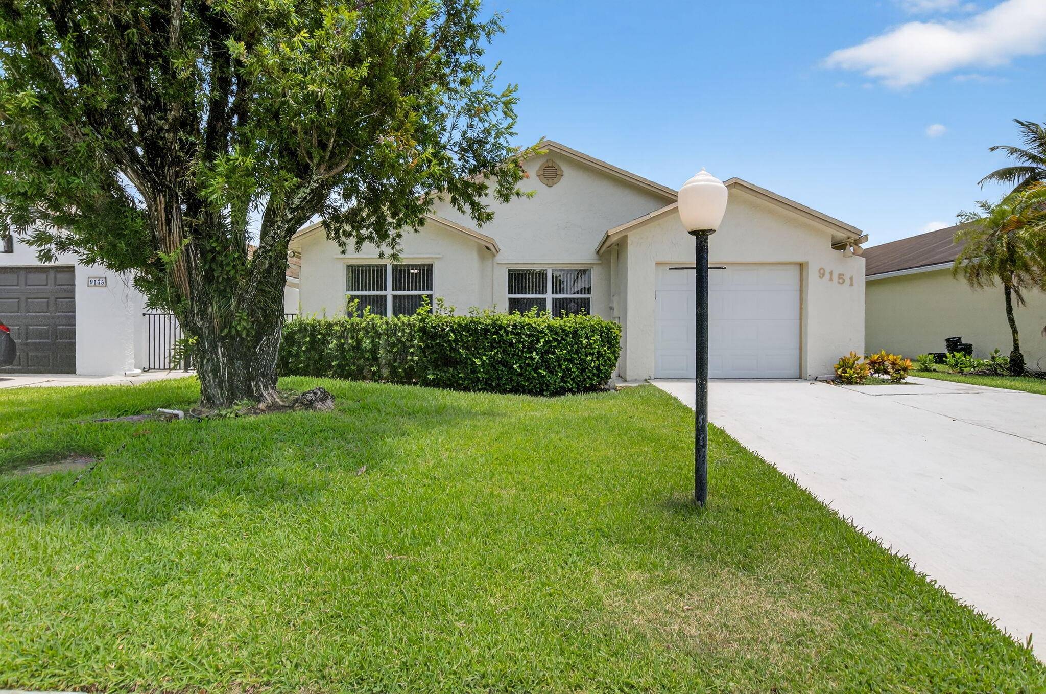 Welcome to this beautifully RENOVATED 2 bedroom, 2 bathroom home in the charming Pine Springs community, located in one of Boca Raton's TOP RATED SCHOOL districts.