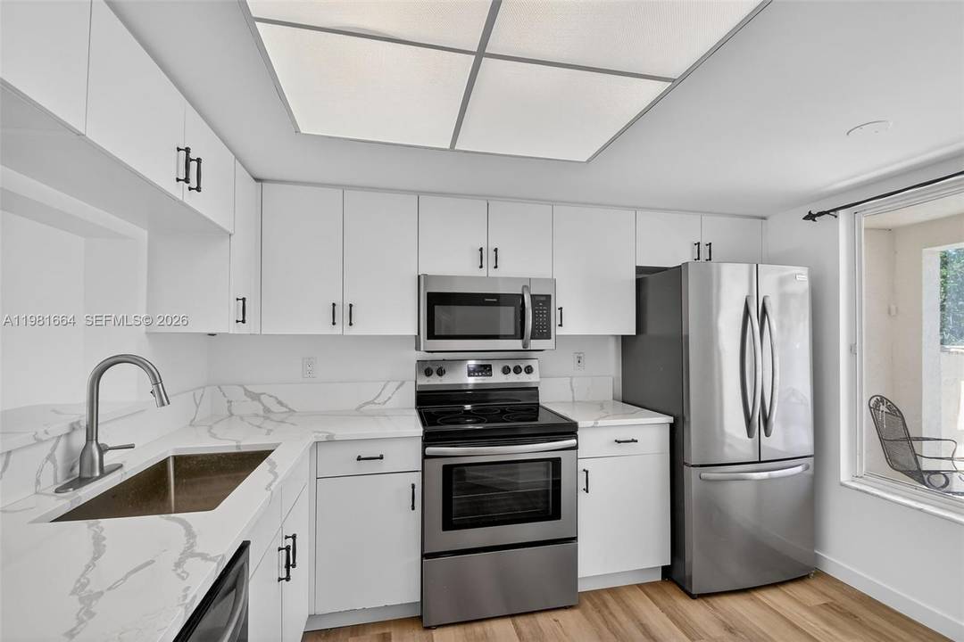 Rare two story townhouse tucked inside one of Hypoluxo's most sought after communities just 5 units in this private nook.