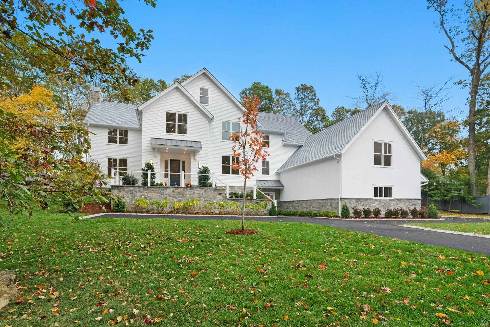 This exceptional Shingle Style Colonial blends form and function to inspire elegant everyday living.