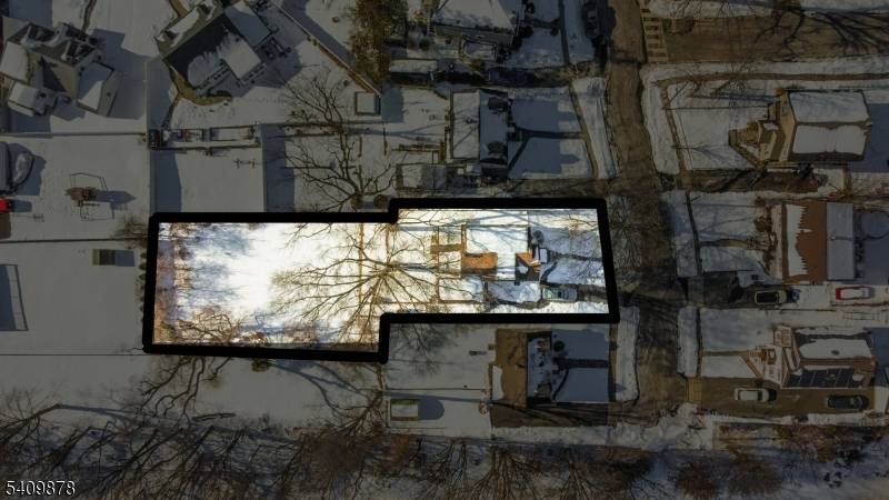 A unique opportunity to acquire an additional rear parcel being sold together with 129 Pake Street in Nutley, offering exceptional potential for future development, expansion, or new construction.