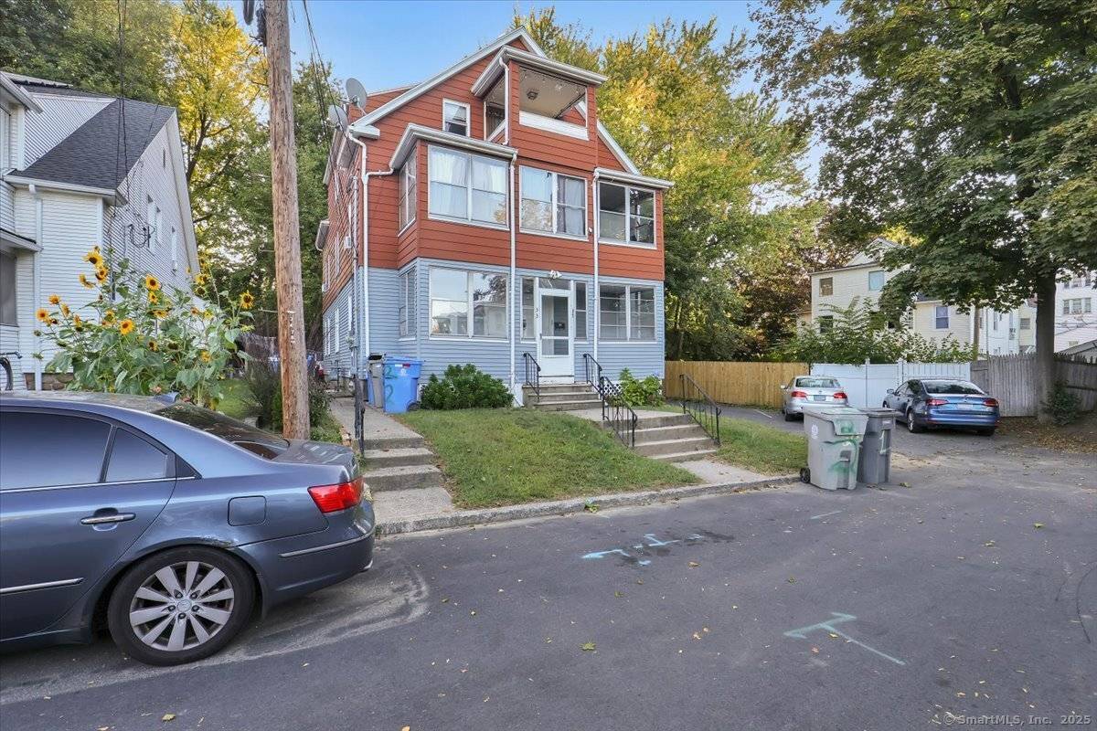 Discover an excellent investment opportunity at 33 Emory Court, Bristol, a well maintained 3 family located on a desirable end lot with ample parking.