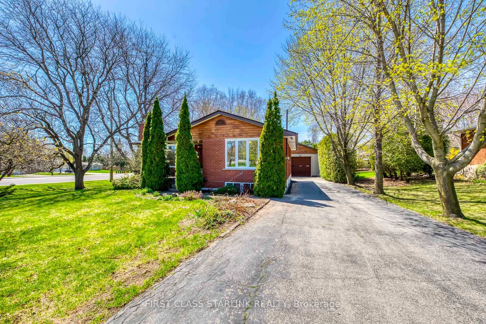 Beautifully updated brick bungalow on a large mature lot just under 0.