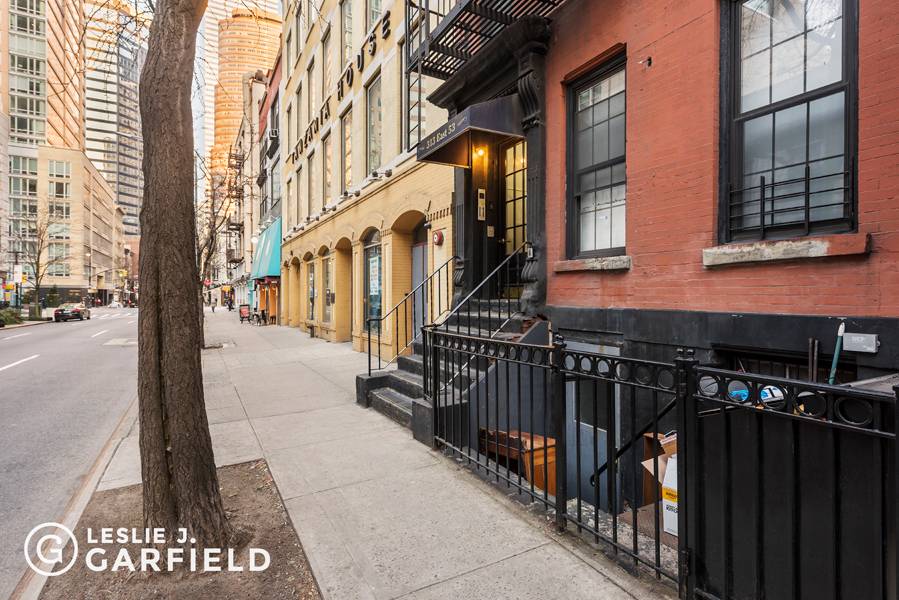 This five story walk up building contains six one bedroom apartments and two two bedroom units.