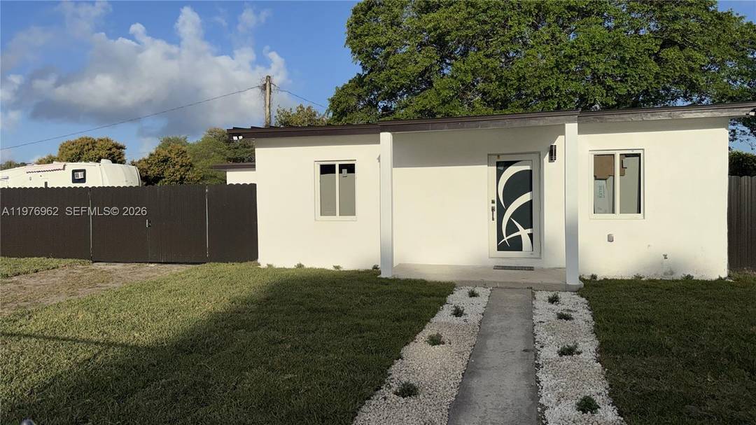 BUY THIS RENOVATED 3 2 SFR WITH A LARGE LOT 5 MINUTES AWAY FROM HARD ROCK STADIUM AND THE FORMULA 1 RACE TRACK.