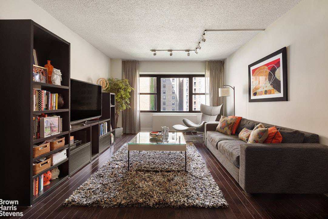 Handsomely renovated, this one bedroom, one bathroom home features an inviting entry with two closets, oversized living dining area, and bedroom with double exposure.