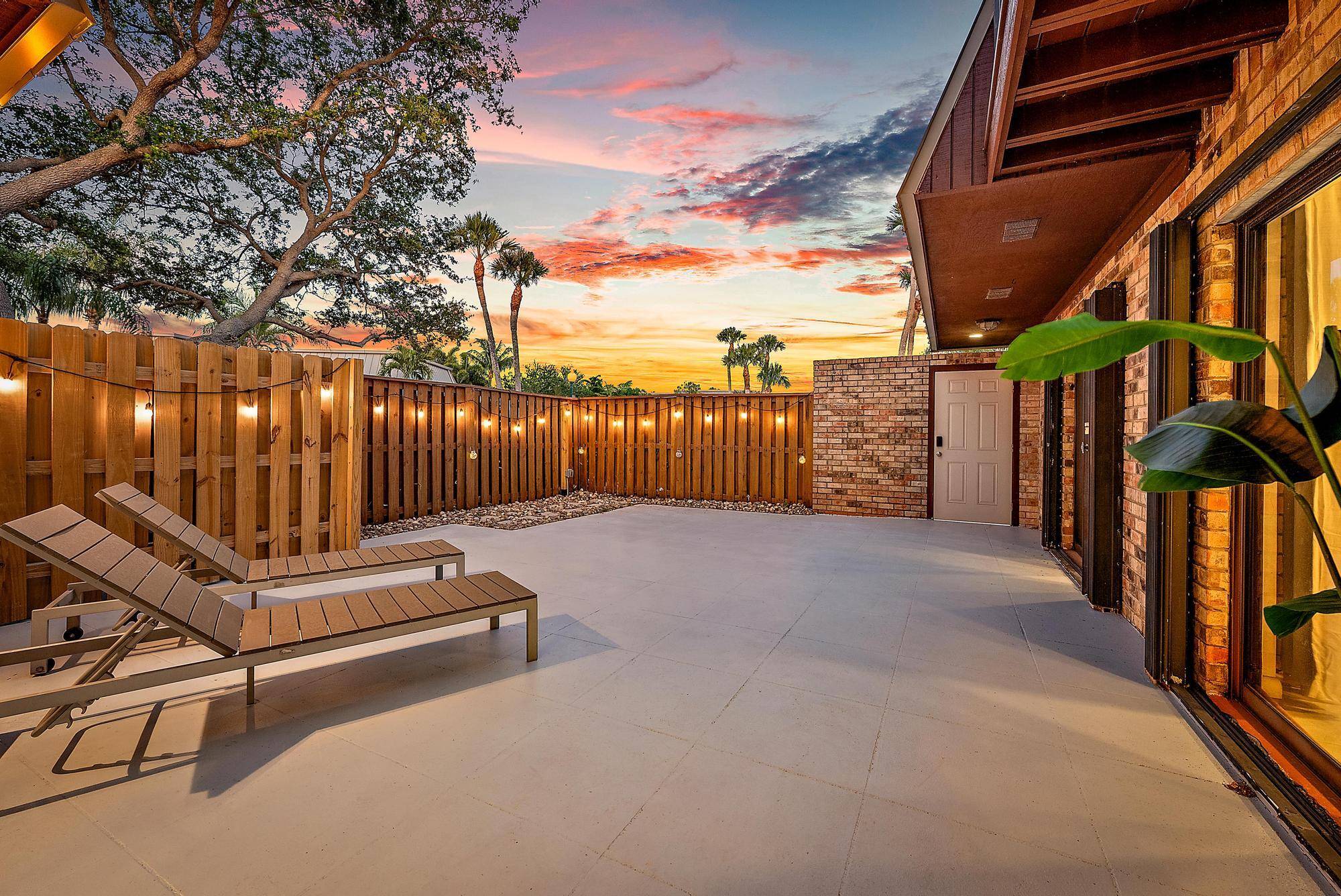 Live Where Others Vacation Just Steps from the Beach.