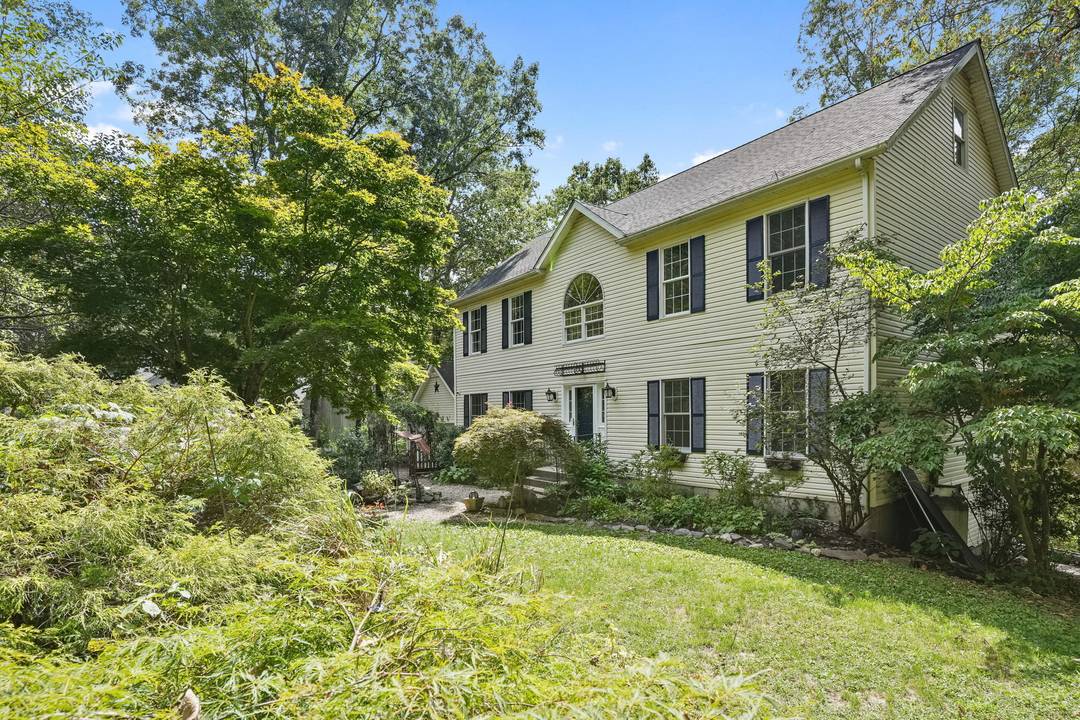 This stunning 4 bedroom colonial home is truly exceptional.