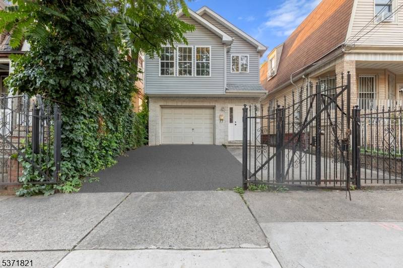 Welcome to 141 Fabyan Place, a beautifully renovated two family home offering a strong investment opportunity in a convenient Newark location.