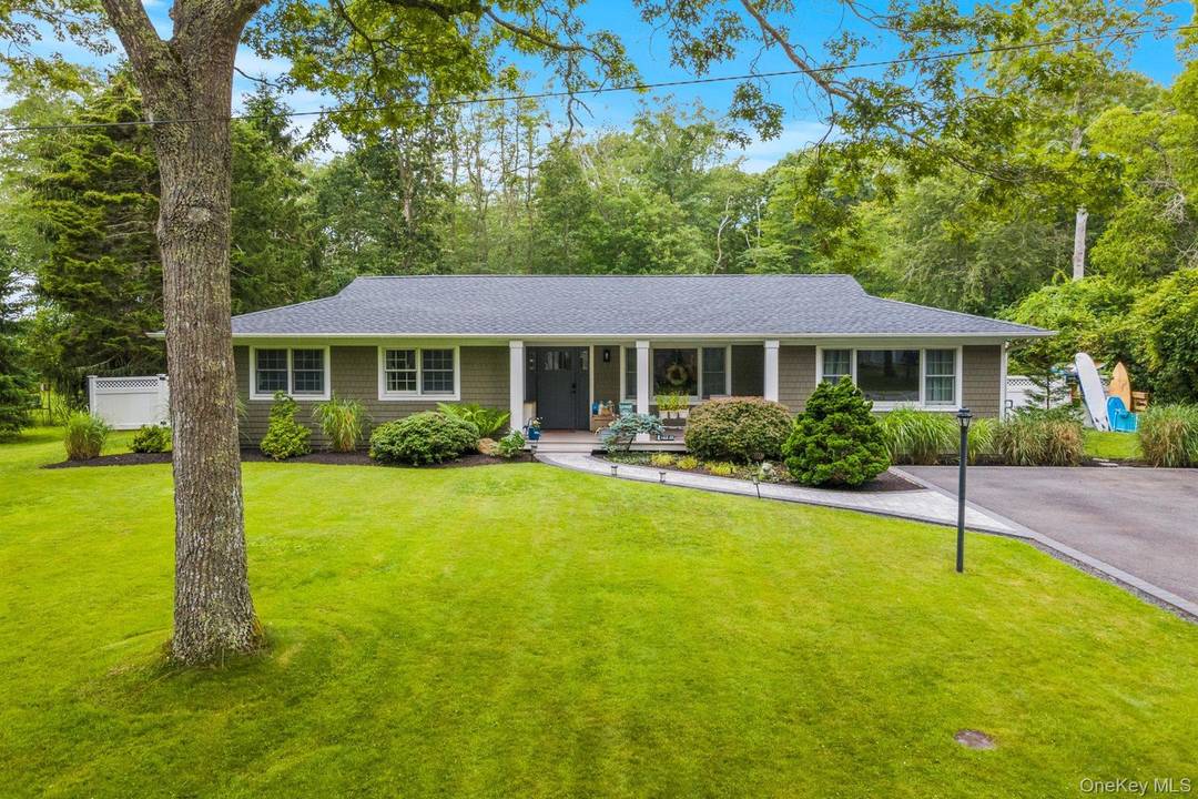 PRIVATE COMMUNITY WITH BEACH amp ; DOCKING RIGHTS Nestled behind the private gates of Pine Neck Landing, a private community in east Quogue, this beautifully maintained residence offers the perfect ...