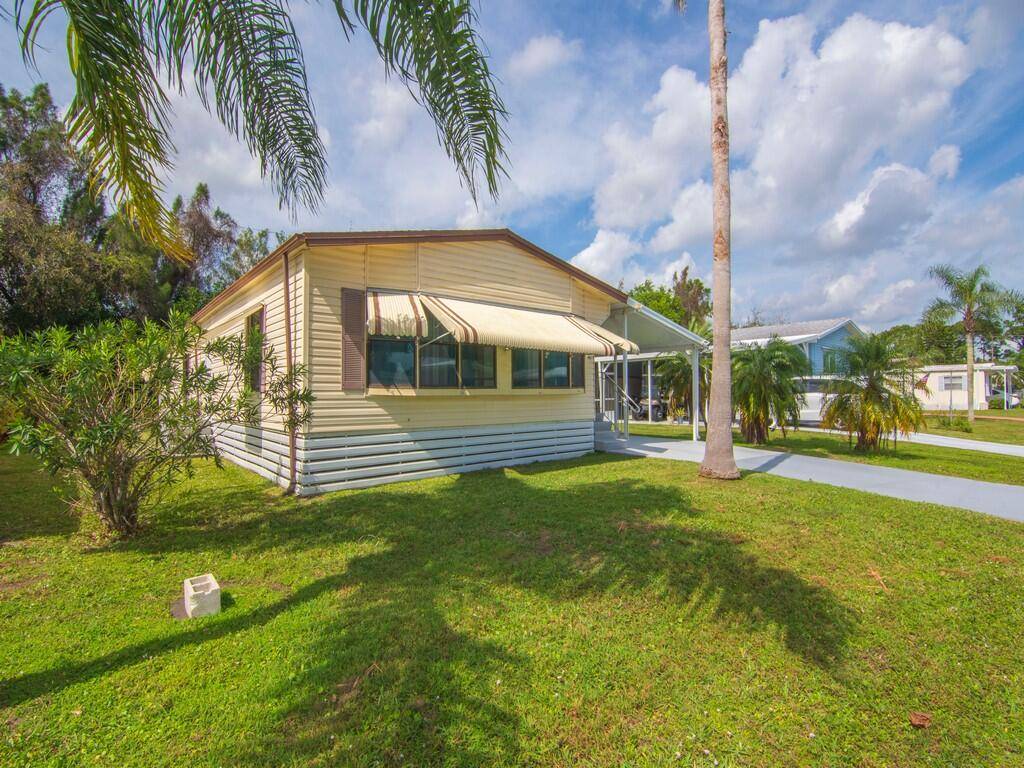 Discover comfortable living in this delightful 2 bedroom, 2 bathroom mobile home located in the highly desirable Spanish Lakes Golf Village, a 55 active community in Port St.