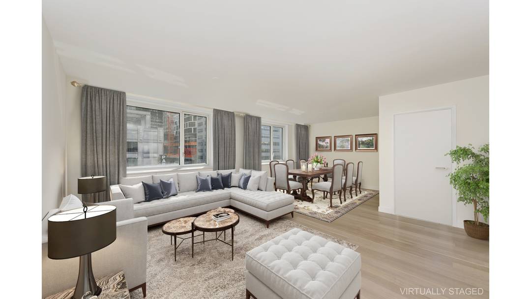This sunlit, corner 2 bedroom, 2 bathroom unit with the potential to convert into a 3 bedroom offers approximately 1, 040 sq ft of open concept living.