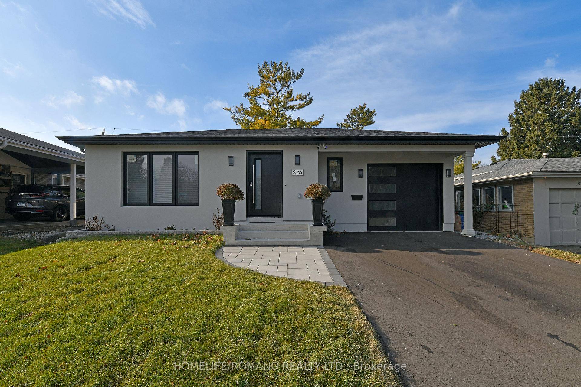 Step into sophistication at 826 Krosno Blvd, where elegance meets functionality in this stucco and brick bungalow.