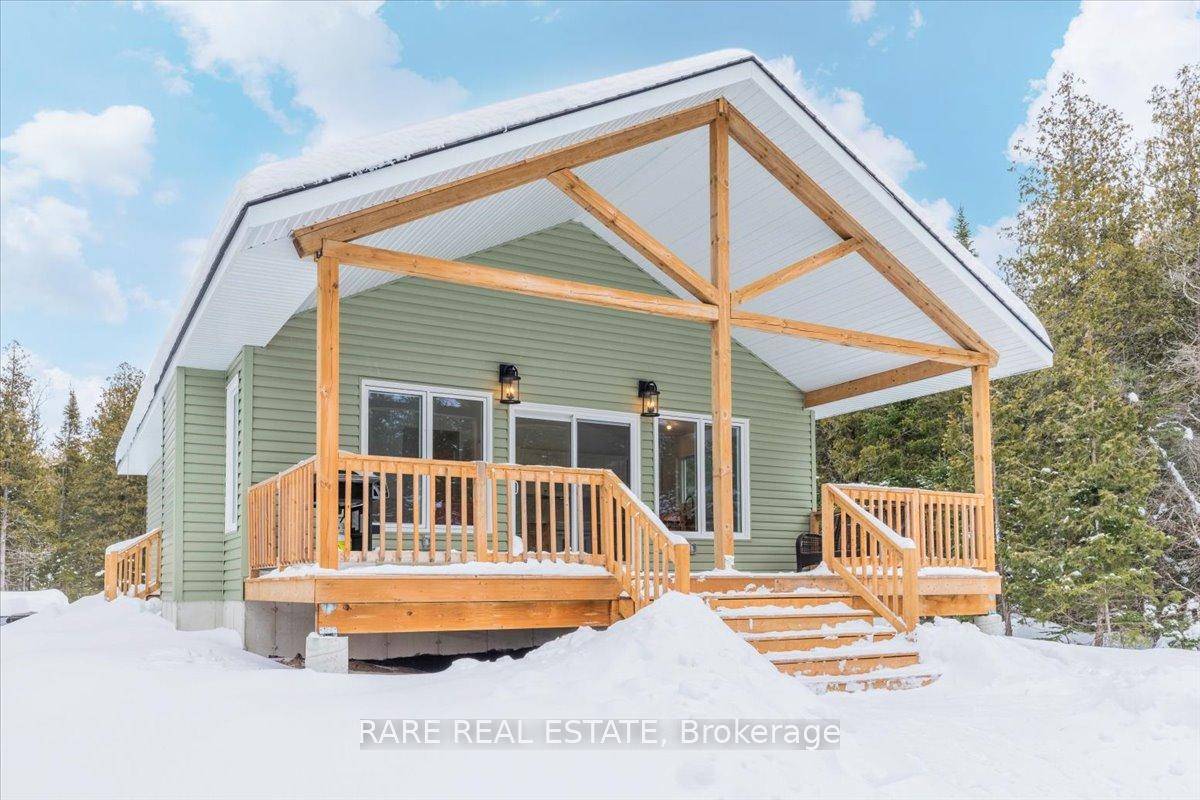 Nestled on two acres just minutes from the pristine shores of Lake Huron on the breathtaking Bruce Peninsula, this newly built home 2022 offers a private, tranquil retreat.