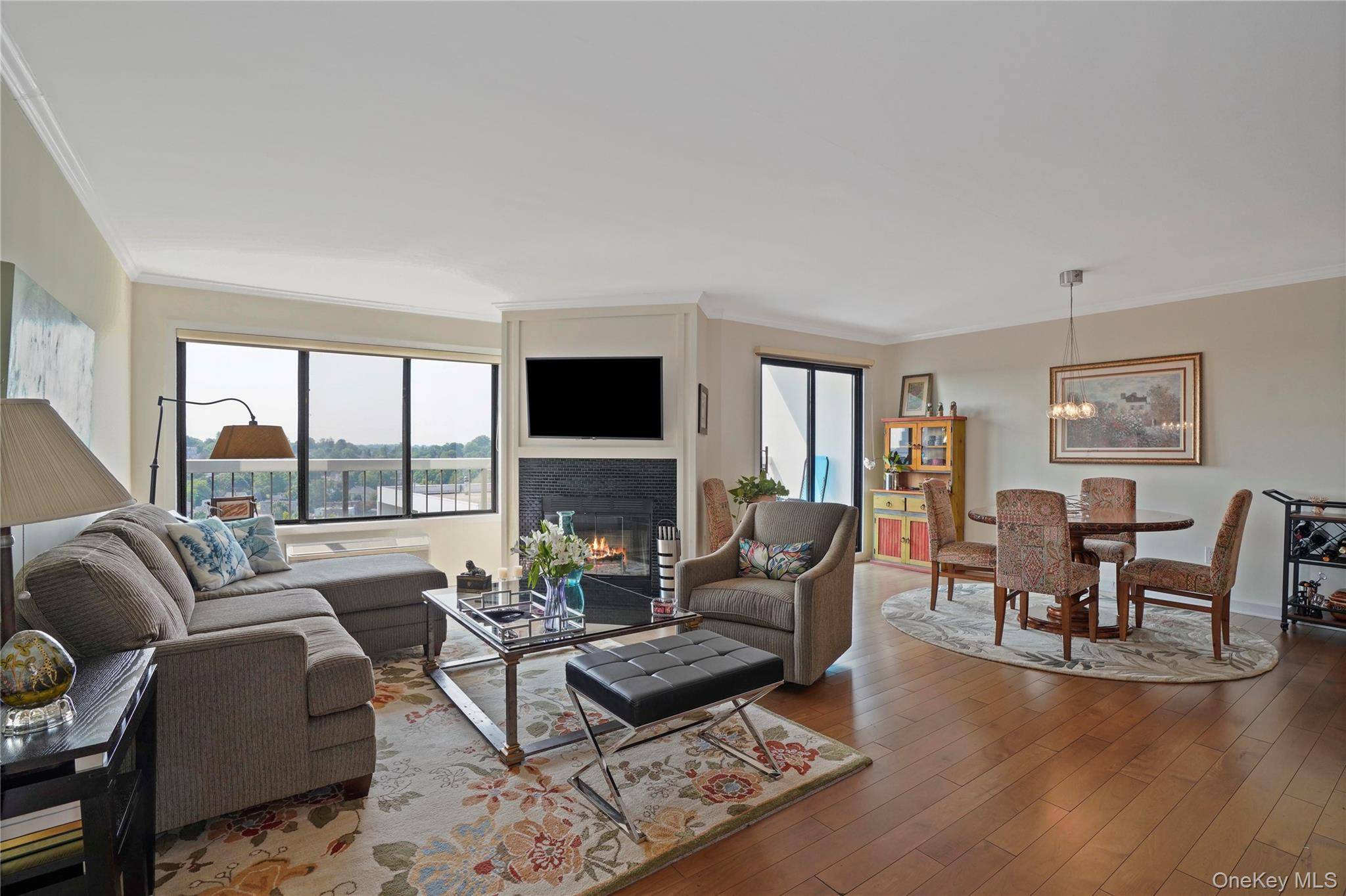 This exquisite penthouse apartment exudes an aura of elegance, openness, and sunlit splendor.