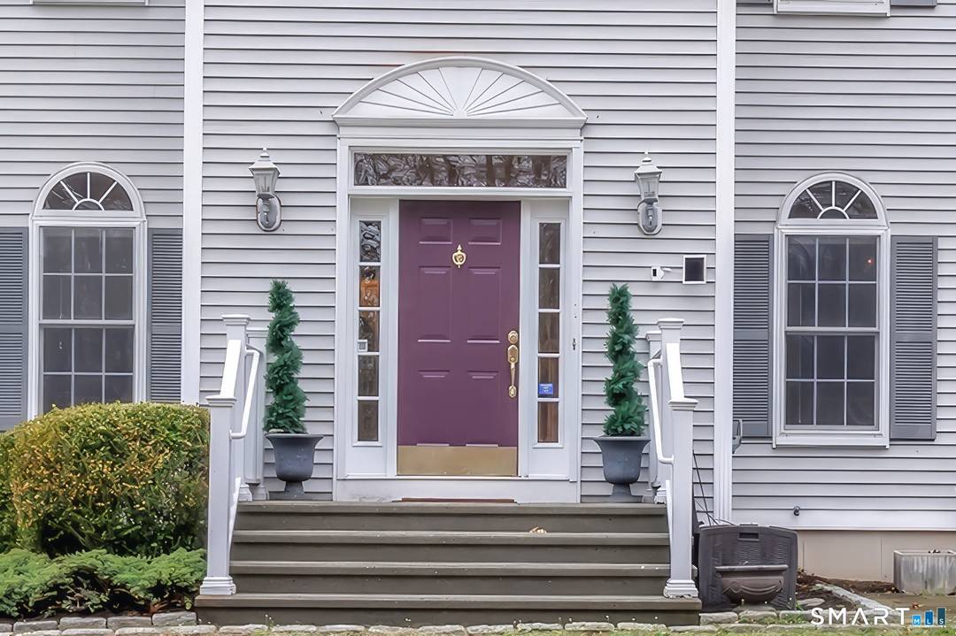 Welcome to this car enthusiast's dream at 170 Whippoorwill Lane In Stratford's desirable Putney neighborhood.