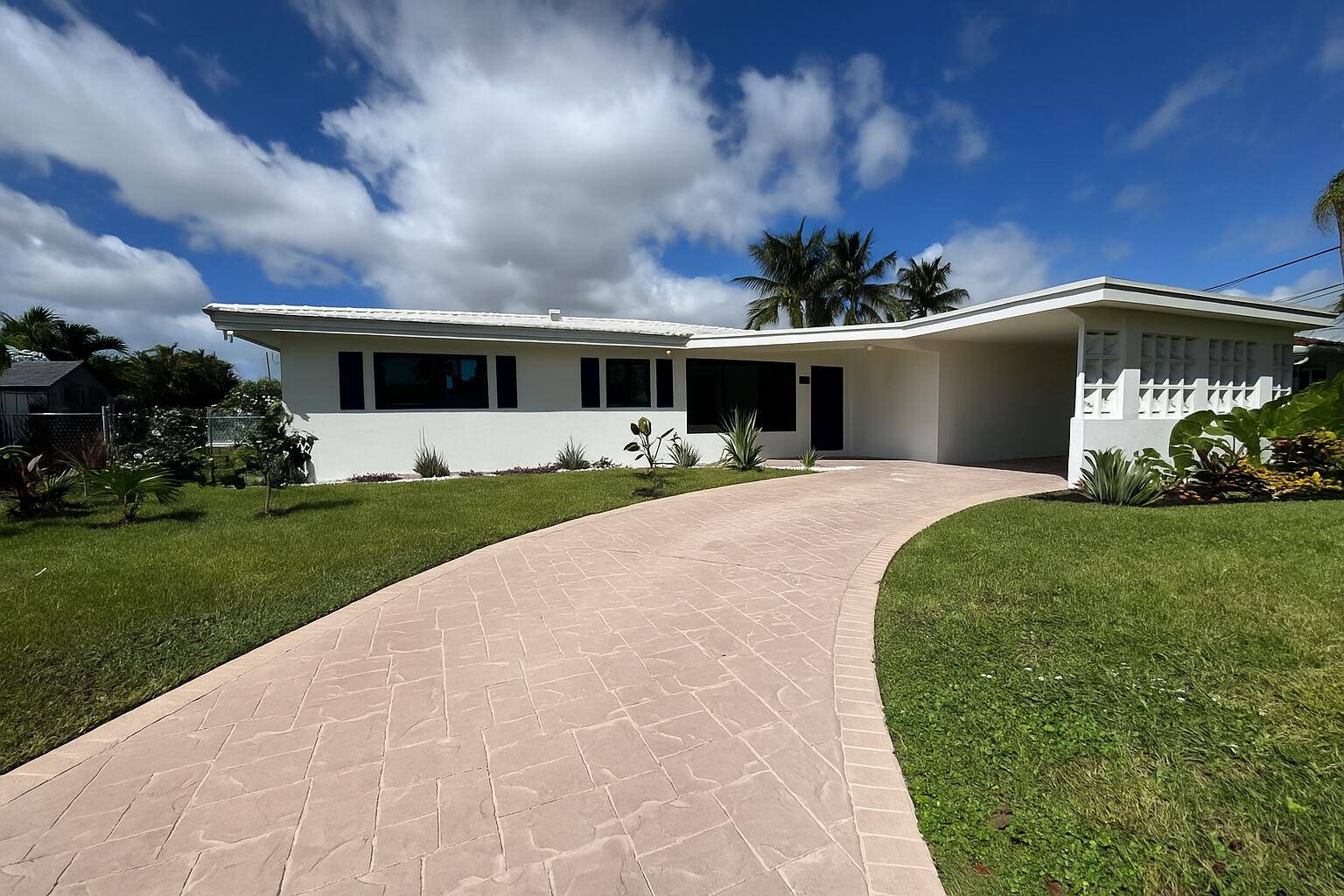 Enjoy waterfront living with 70' of frontage on navigable canal with ocean access and stunning western sunsets.